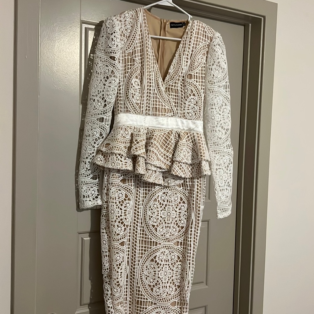 White peplum long sleeve dress